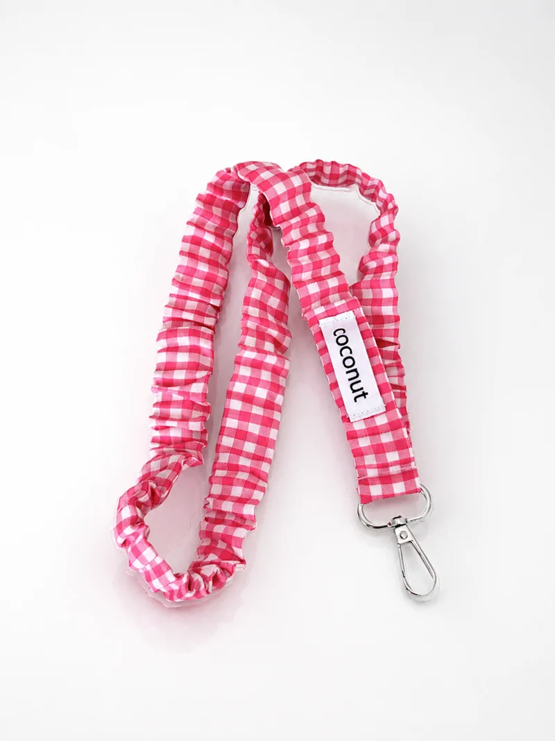 Colgador elástico vichy fucsia