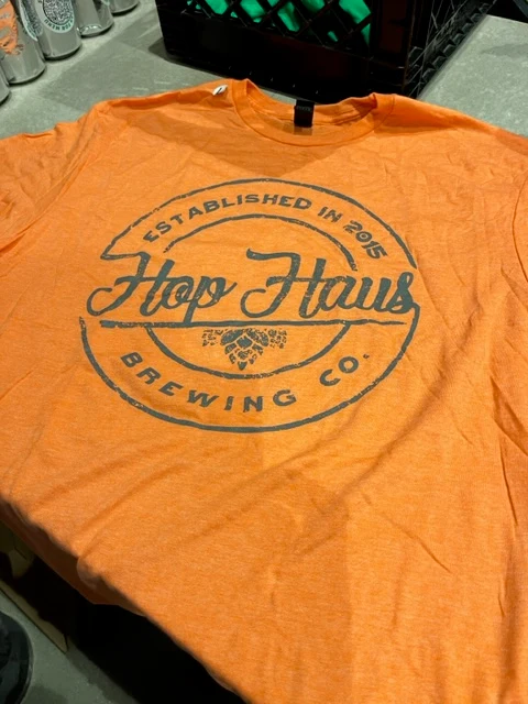 Orange circle logo shirt